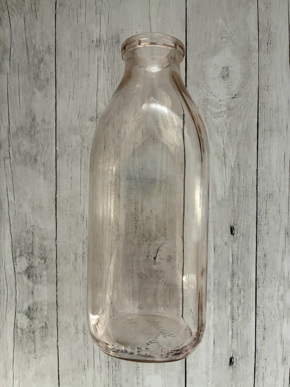 1954 Pink Milk Glass Bottle